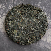 Ancient trees pu'er tea Shengpu, Lunan Sheng Pu'er tea, gushu Sheng pu'er, 2024 Sheng pu'er, Yunnan compressed puher tea cake, leaves detail