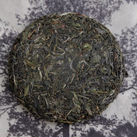 pu'er sheng pu from a Yunnanese forest on mountain Nannuo, hand crafted, from Chinese tea farmer, pressed cake, high quality tea