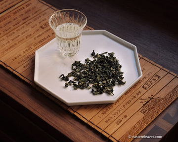 Tieguanyin wulong tea low roasted flowery in glass cup teaware, from China, Fujian, loose leaf premium tea