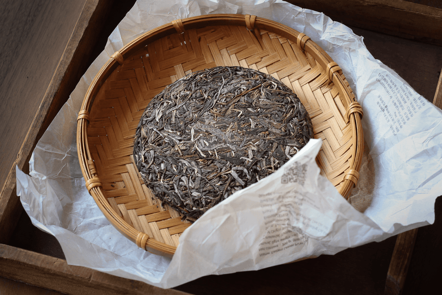 pu'er tea pressed in brick cake from Youle mountain, Yunnan, Xishuangbanna, with loose-leaf detail